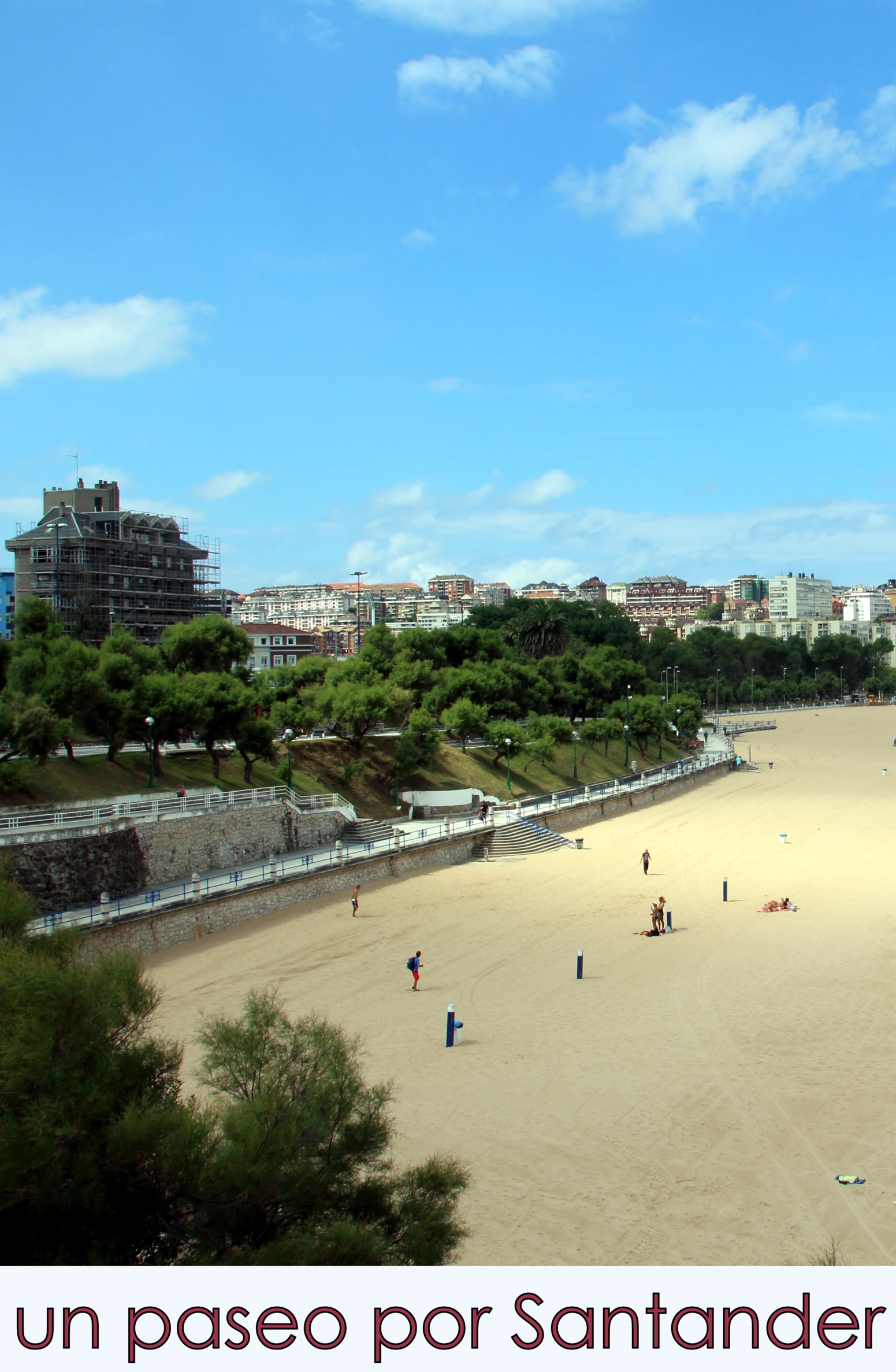 a beach has people walking and walking on it