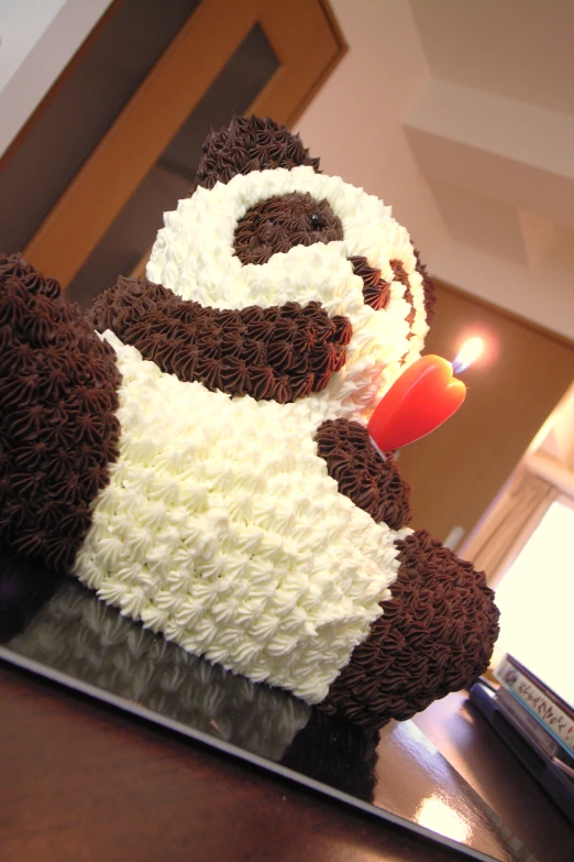 a decorated cake sitting on top of a table