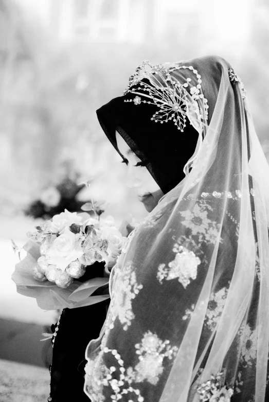 a woman is dressed in traditional wedding garb