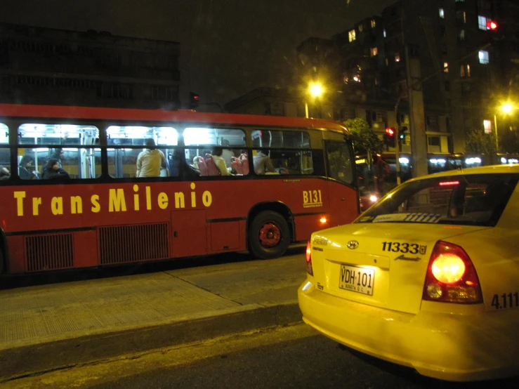 a public transit bus is traveling down the street