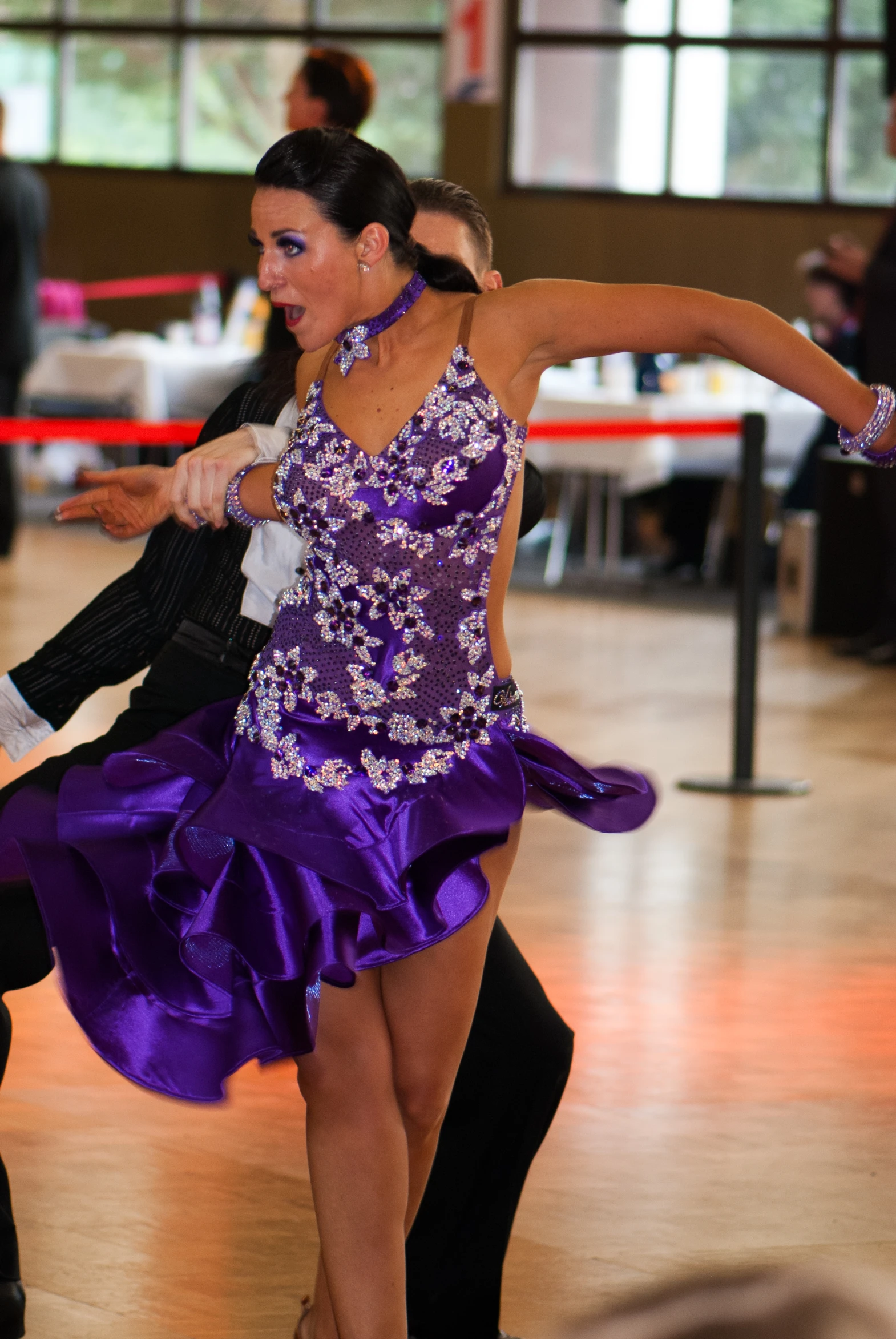 there are two women in a dance hall