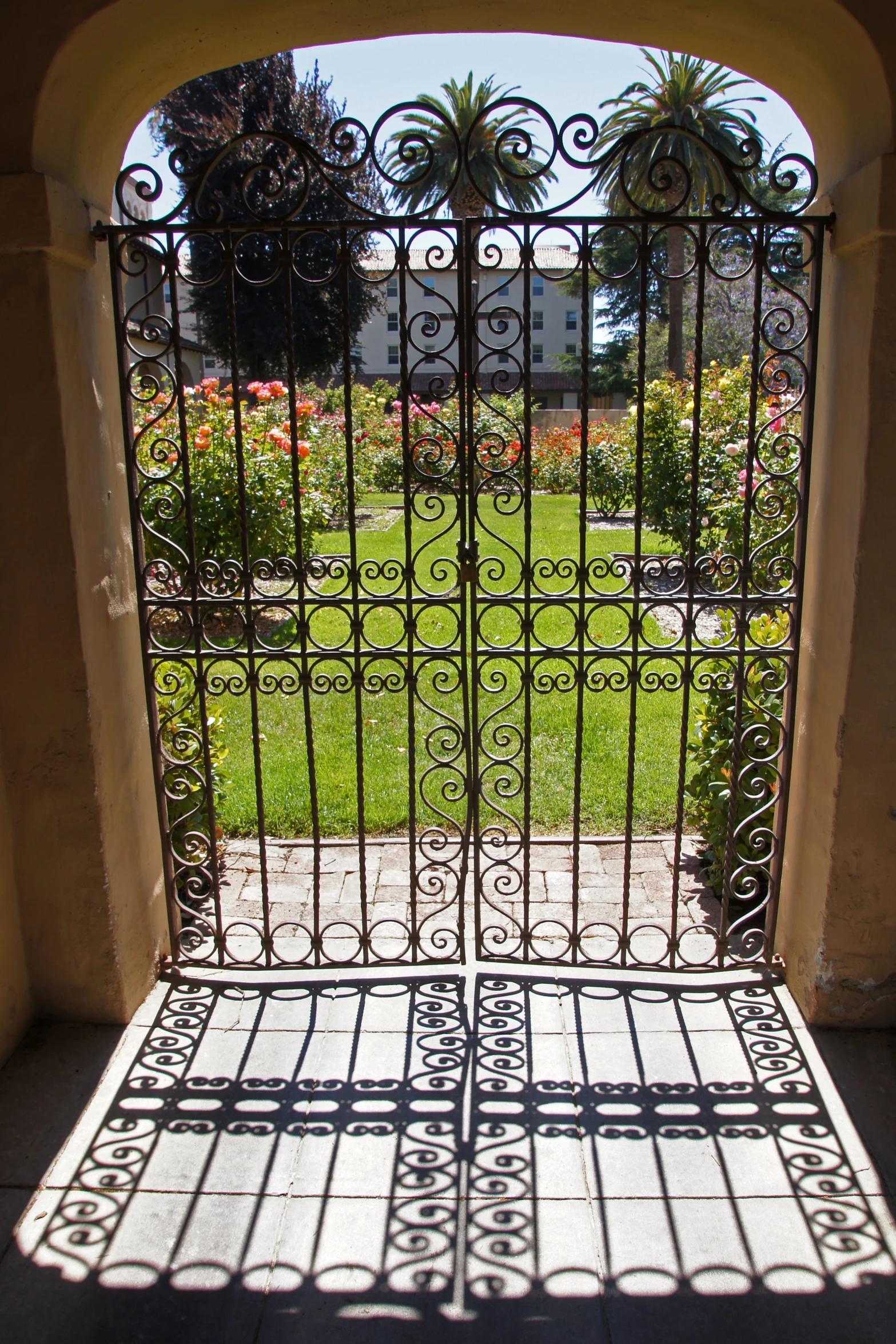 a gate that has wrought iron on it