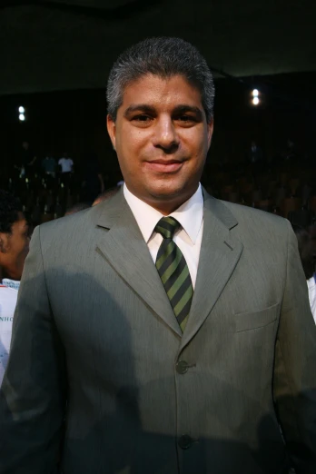 a man in a suit with grey hair