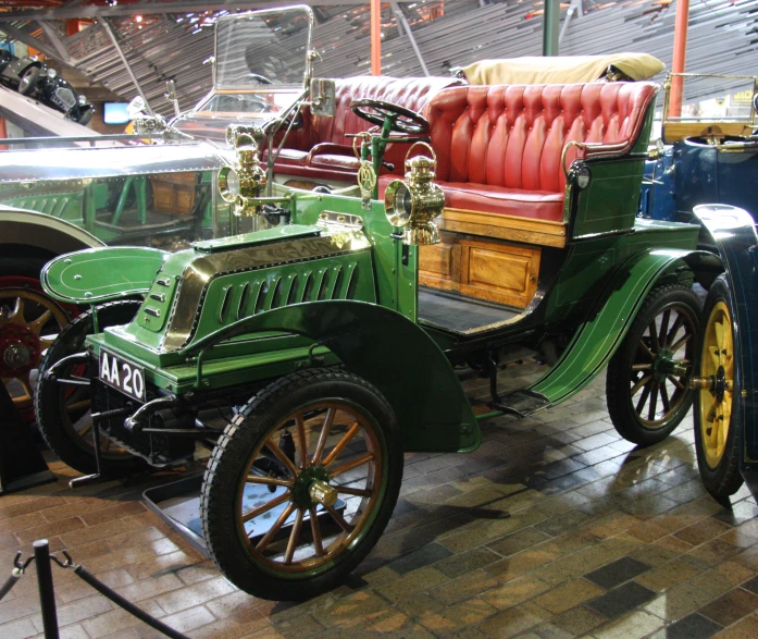 a group of vintage cars are on display