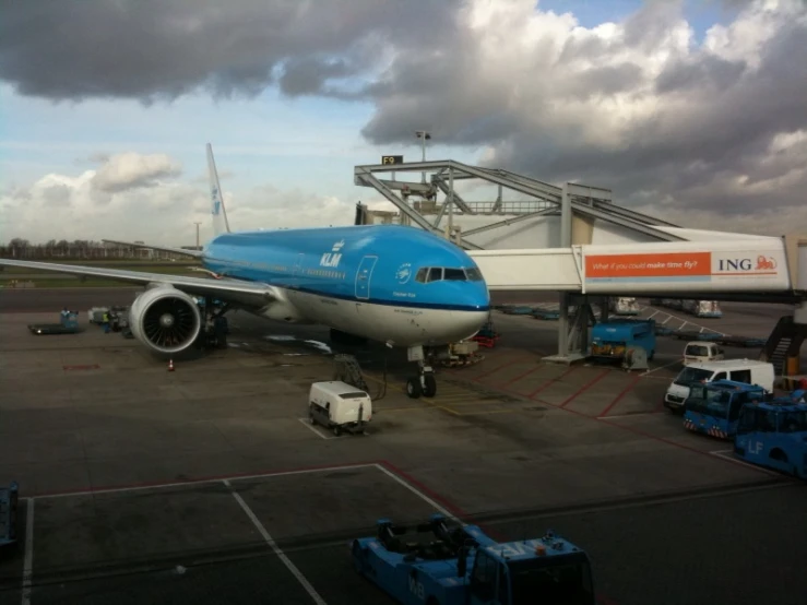 a passenger jet parked on a runway at an airport