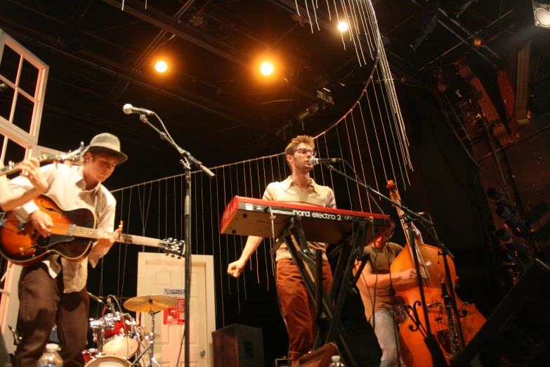 an image of a band playing and singing