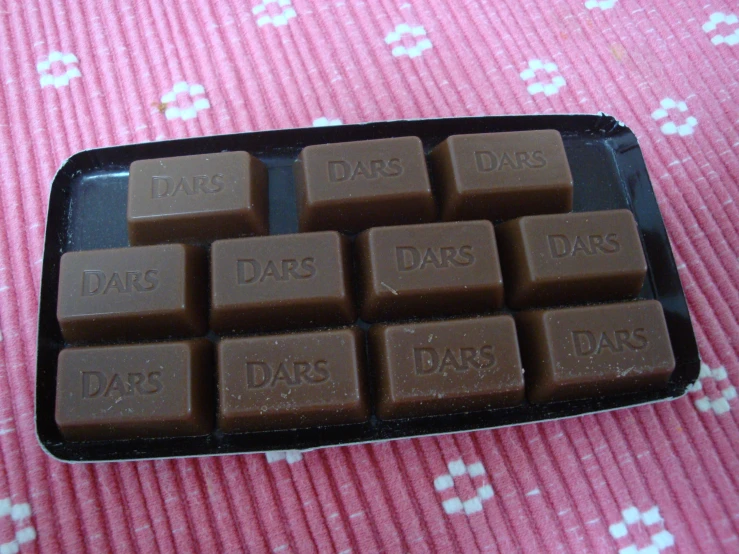 a chocolate bar made with dark chocolate on a table