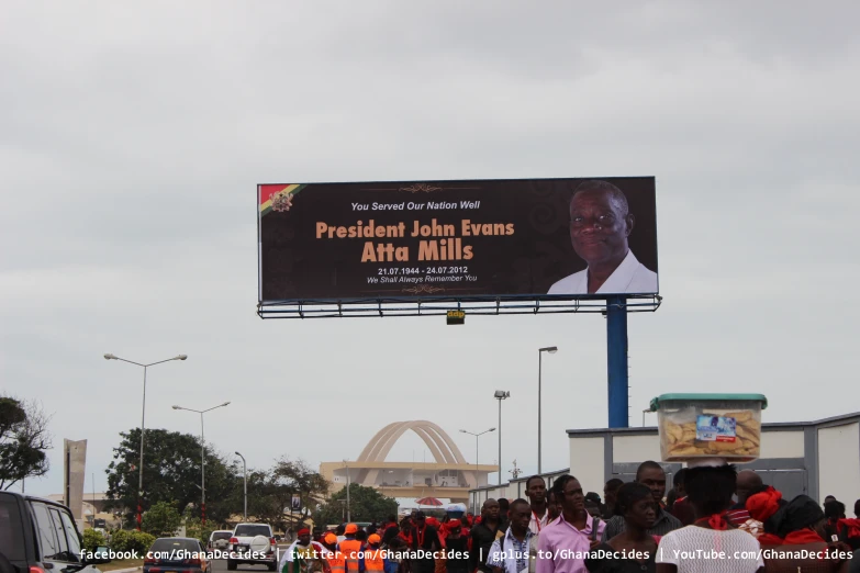 there is a large billboard showing the president john davis