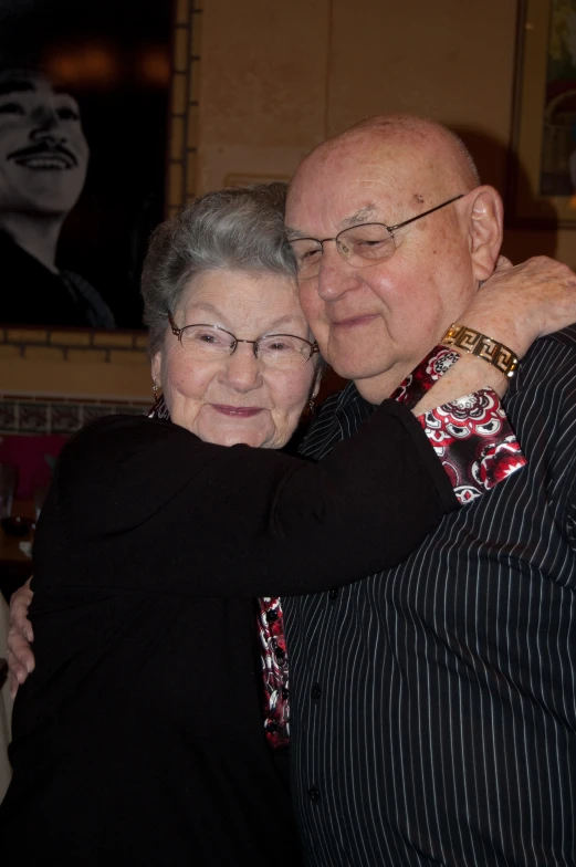 an older couple emce as they enjoy their dance