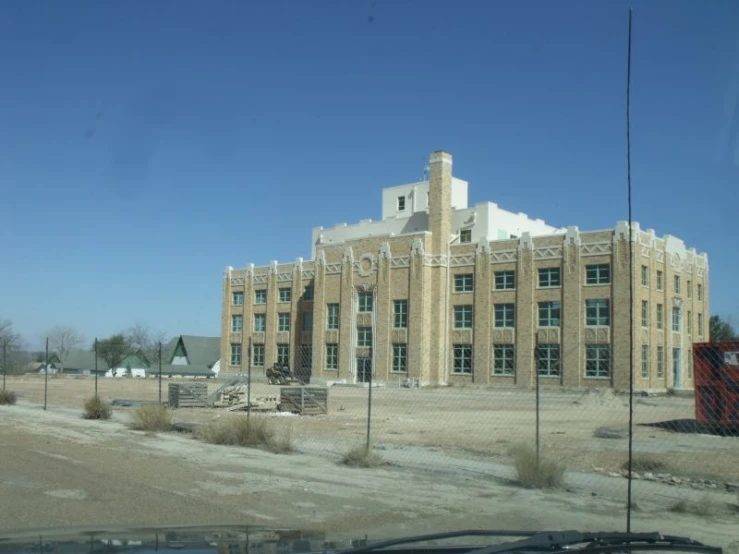 an old abandoned and boarded up school building