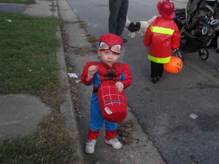 a  dressed in costume with an antman on his back