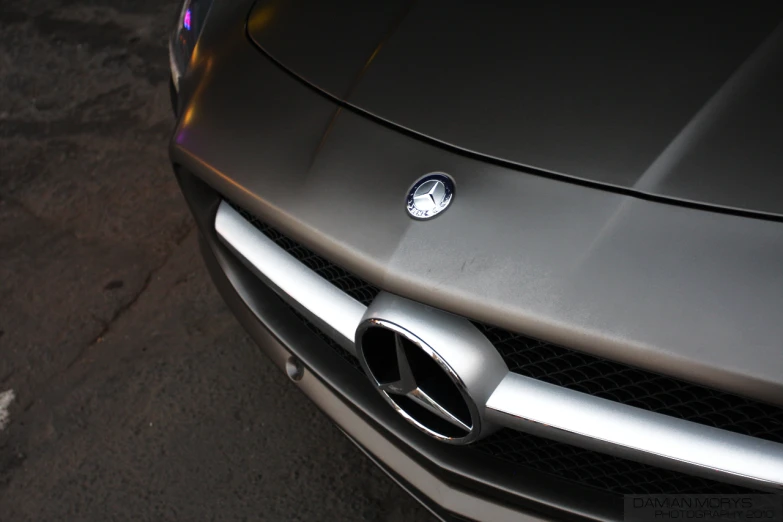 the front grill on a silver sports car