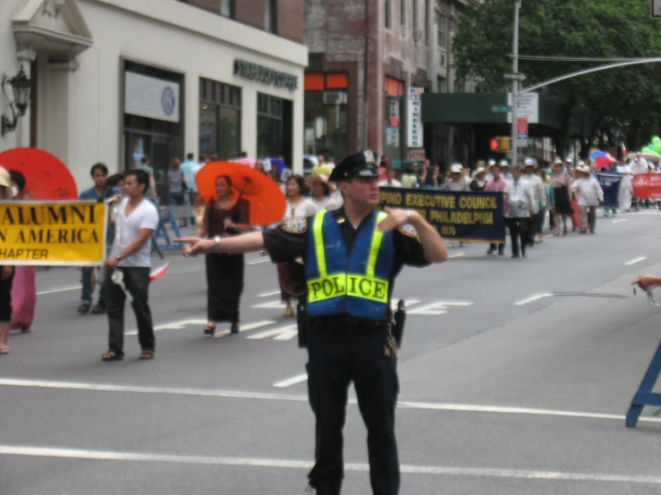 a police officer standing in the middle of a street