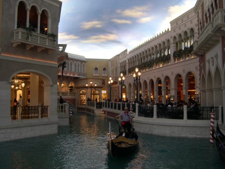 a gondola on a canal in an ornate building