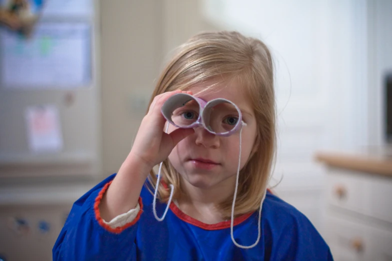 the  is listening with her glasses