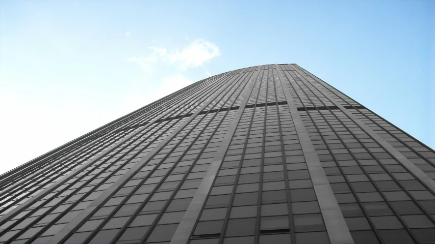 the view looking up at a very tall building