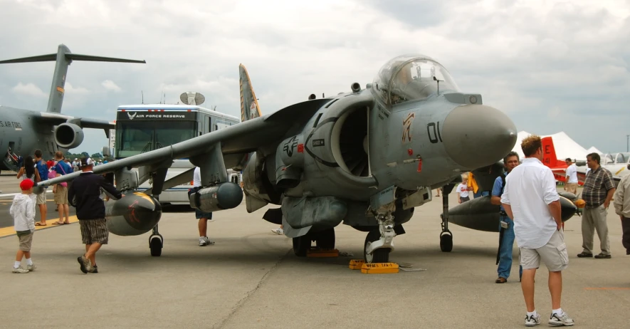 a large jet sitting on top of an airport tarmac