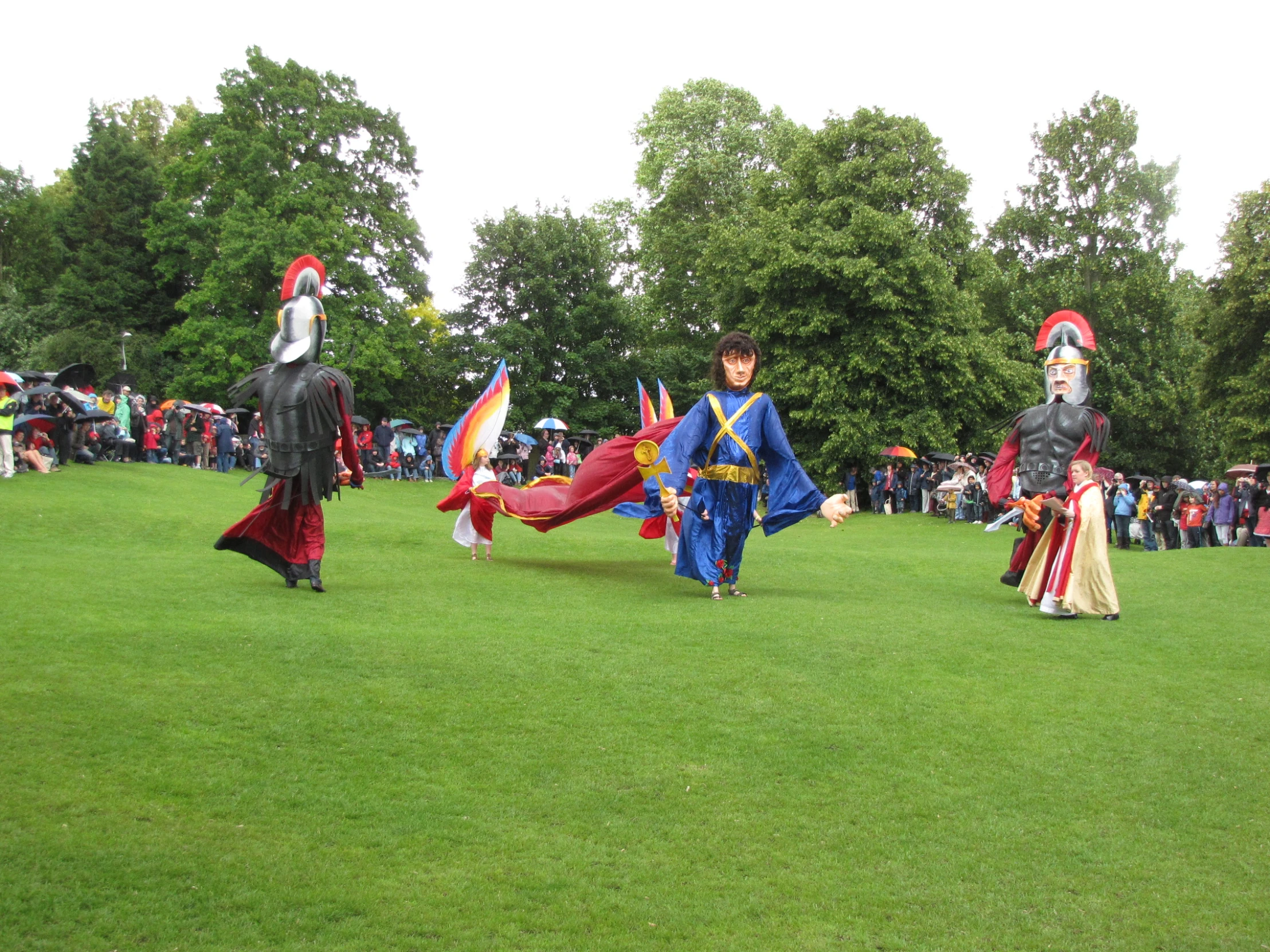 a number of people in costume on a field