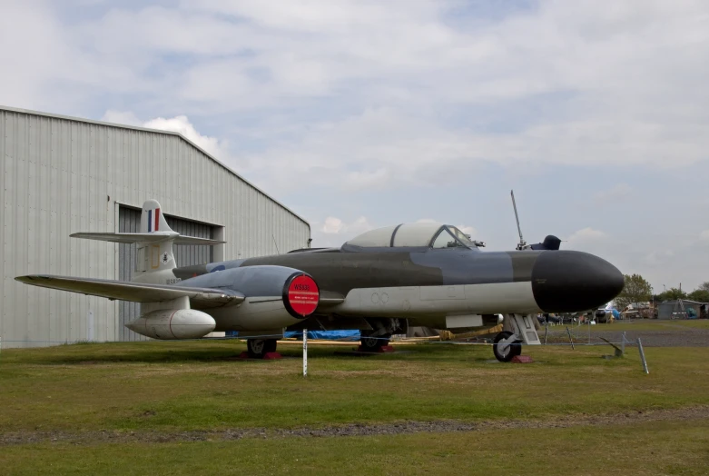 a large plane on display at an airport