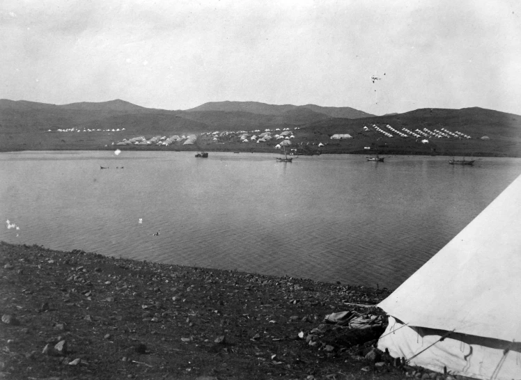 an old po of some boats in the water