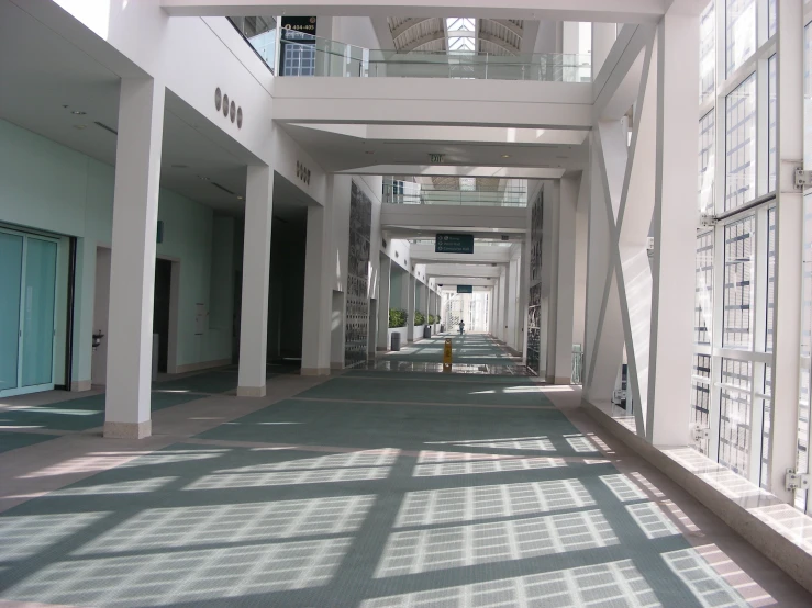 a building with a skylight and lots of windows on the sides of it