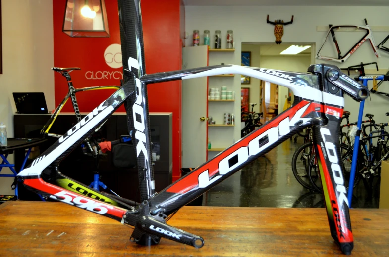 a bicycle is displayed on a wooden table