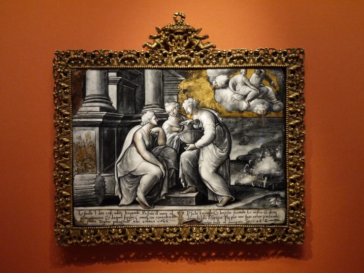 a painting with gold framed frame hanging on the wall