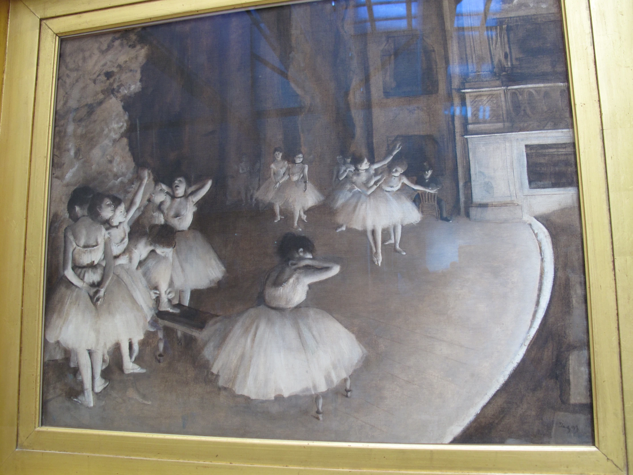 an old po with ballerinas standing on the stage