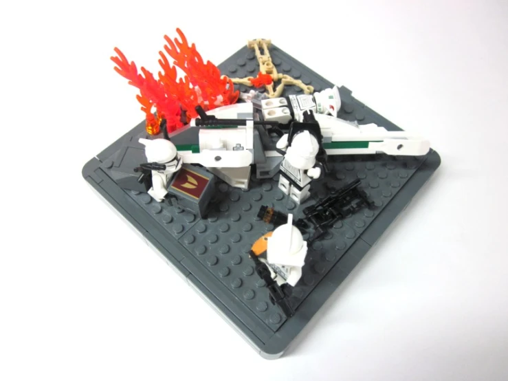 a lego stormtroop sitting on top of a lego base