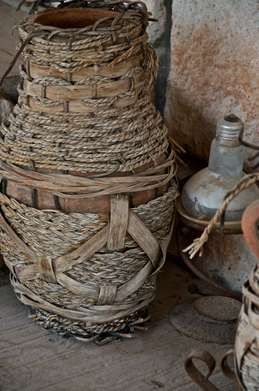 some wicker baskets that are sitting on the floor