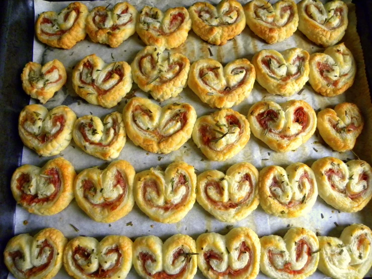 a variety of pastries in a baking pan