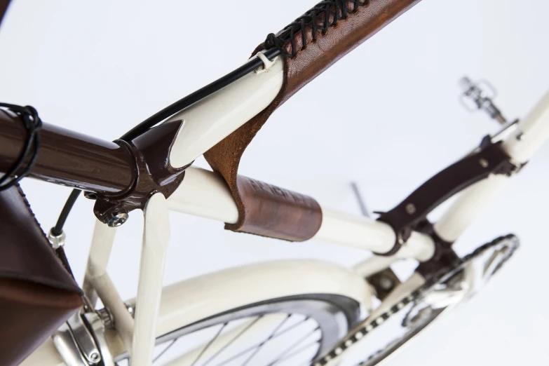 the leather straps on a bicycle are very elegant