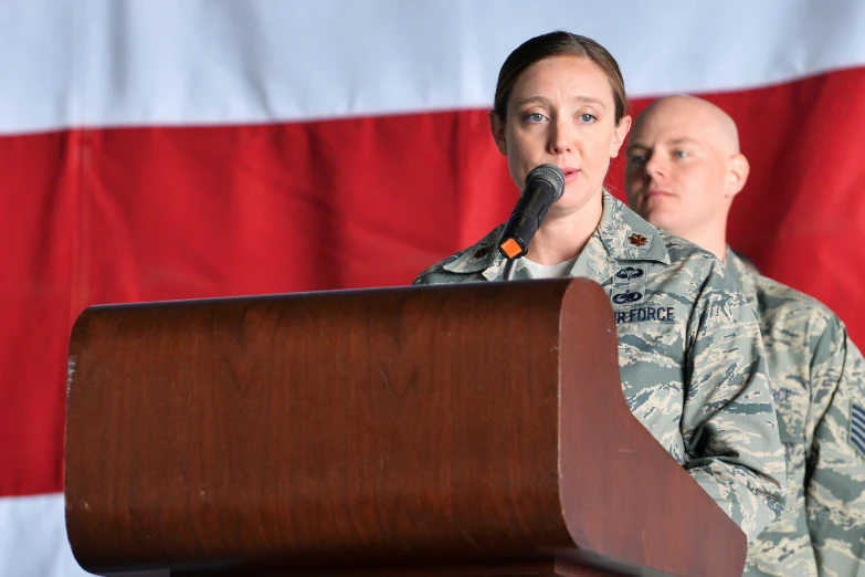 this is a po of military woman delivering speech