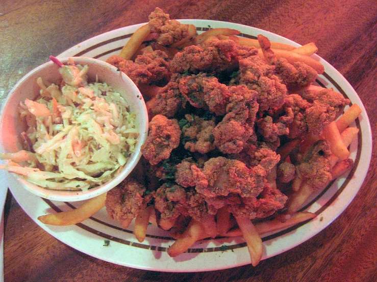 a plate with several plates of food including vegetables