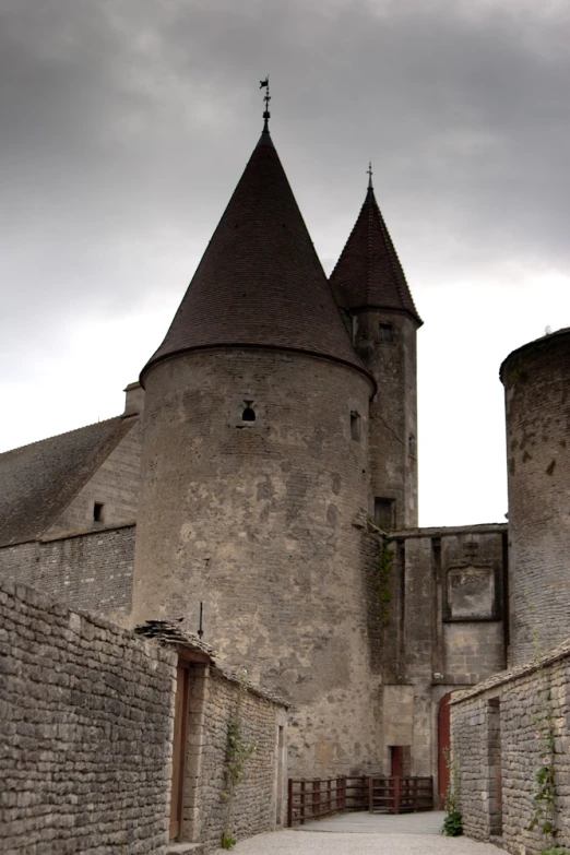 a large castle on top of a building in an alley