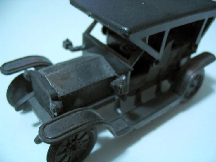 a plastic model of an antique model car