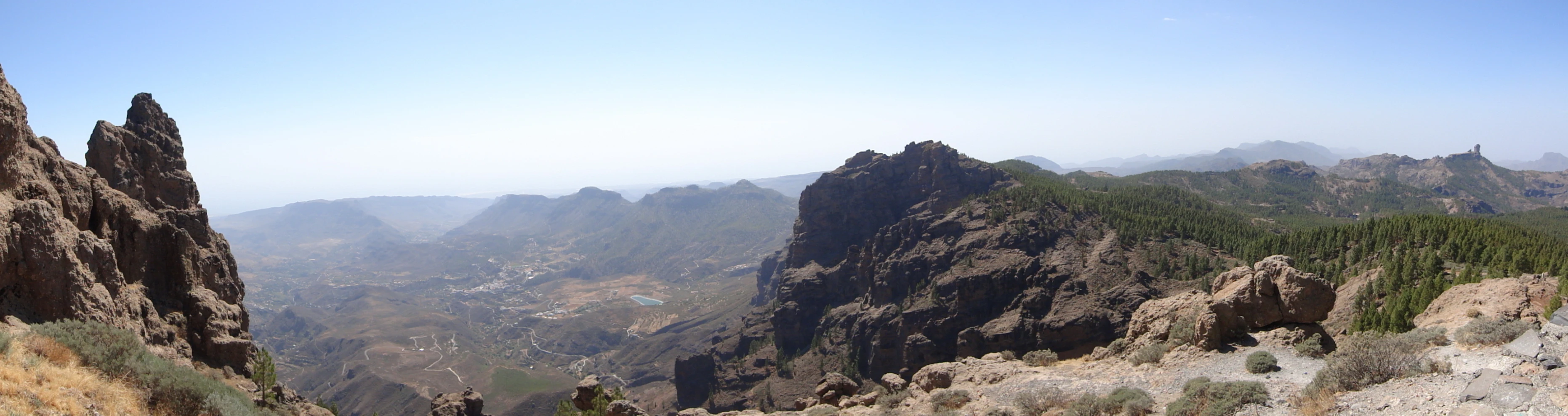 a mountain side scenic view is shown from above