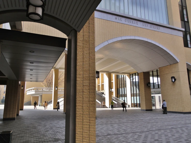 two stone columns in a courtyard, one for the staircase and one for the stairway