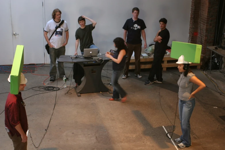 an image of a group of people with green screen for a video