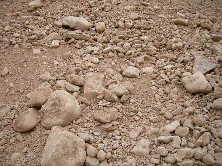 a rock field with stones and gravel around it