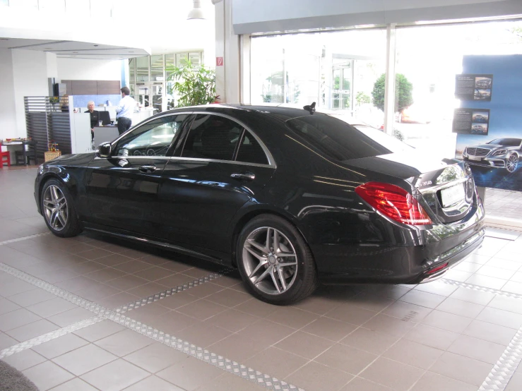 a mercedes is on display in a building