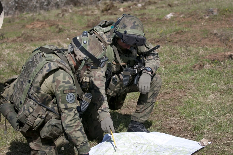 soldiers and sailors in uniform on the ground