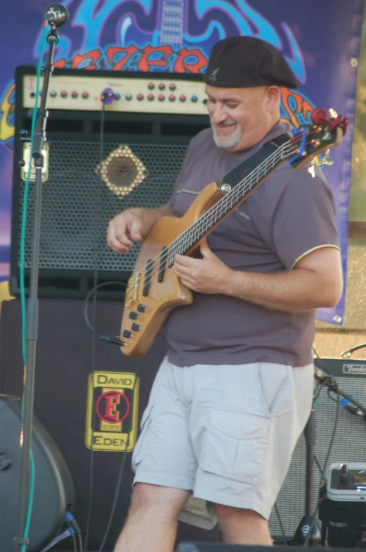 an image of a man that is playing guitar