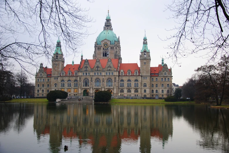 a big building with some towers over it