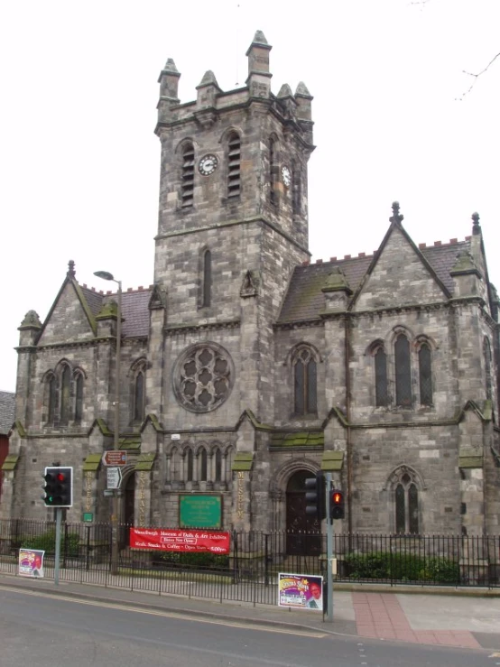 large, old stone church with a tall steeple