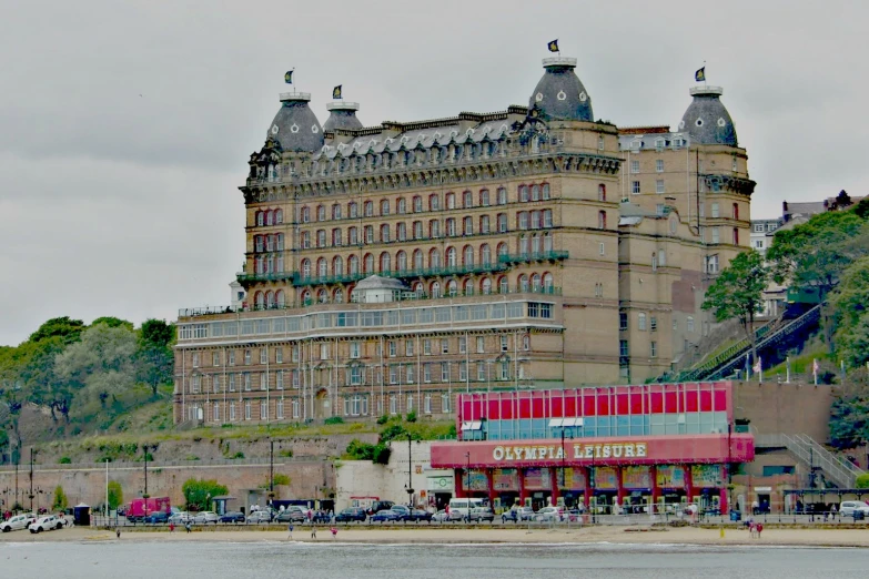 an image of a old building on the shore