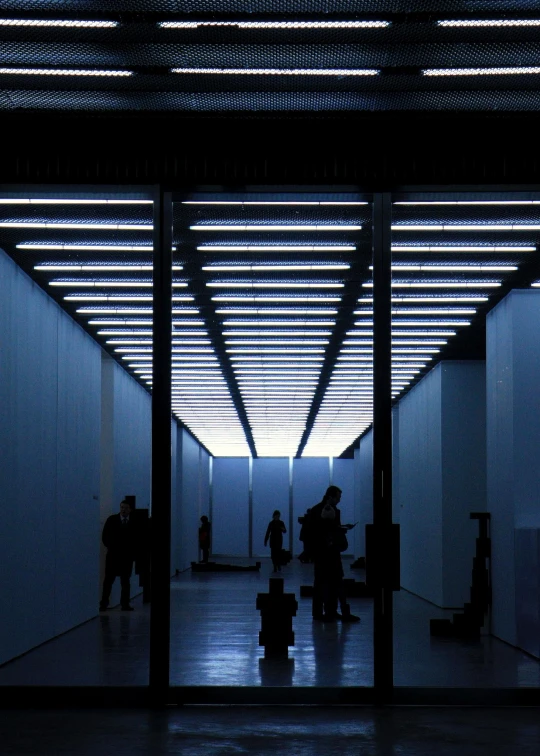 a dark room with an array of different lights