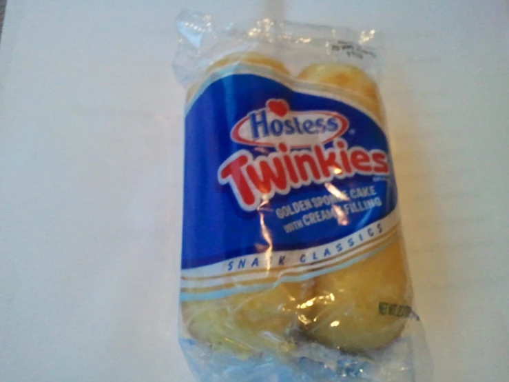an packaged hostess twinkies bag sitting on top of a table