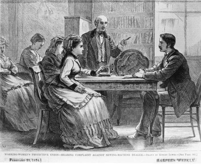 a man and woman are seated at a table with an elderly man, an unknown man and a young woman