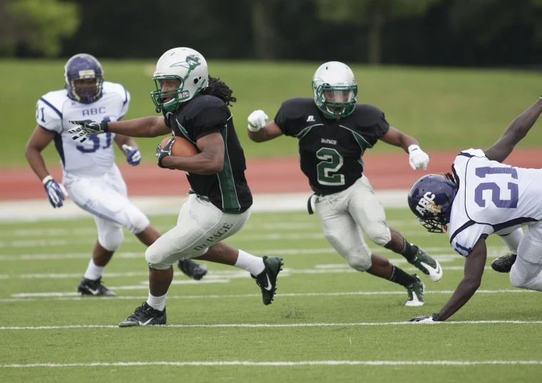 a couple of football players on a field